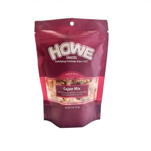 Front view of maroon Howe Snacks' Cajun Mix bag